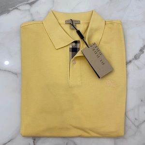 Burberry polo brand new with tags buttercup size large